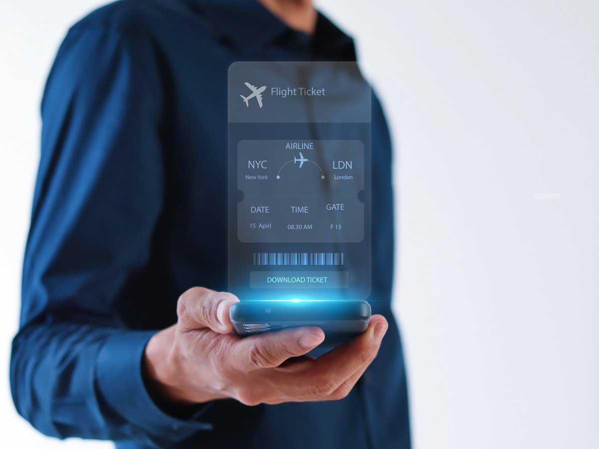 Businessman are booking airline tickets online via virtual smartphones. airline online check-in flight ticket booking app concept.airline ticket reservation, mobile flight search.